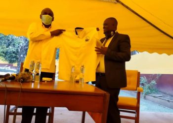 HON MIKE MUKULA RECEIVES DEFECTING DP BOSS